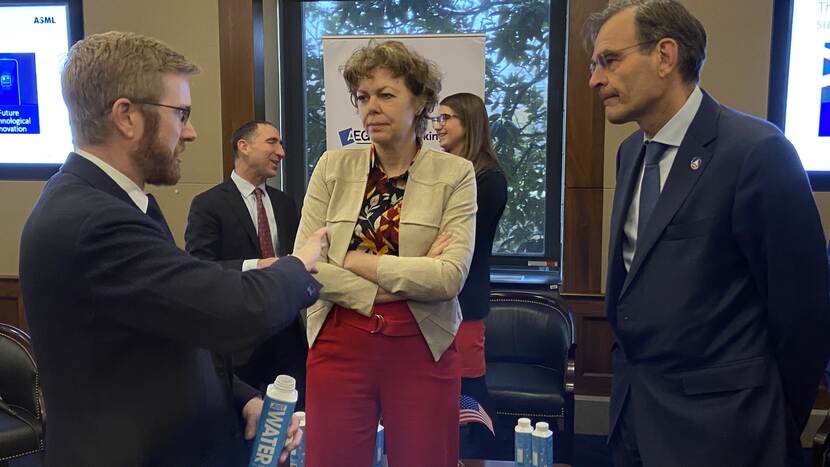 Ingrid Thijssen, president of the Netherlands Confederation of Business and Employers, speaks with U.S. Representative Peter Meijer (left) and Ambassador André Haspels after the lunchtime seminar on Capitol Hill about the semiconductor industry.