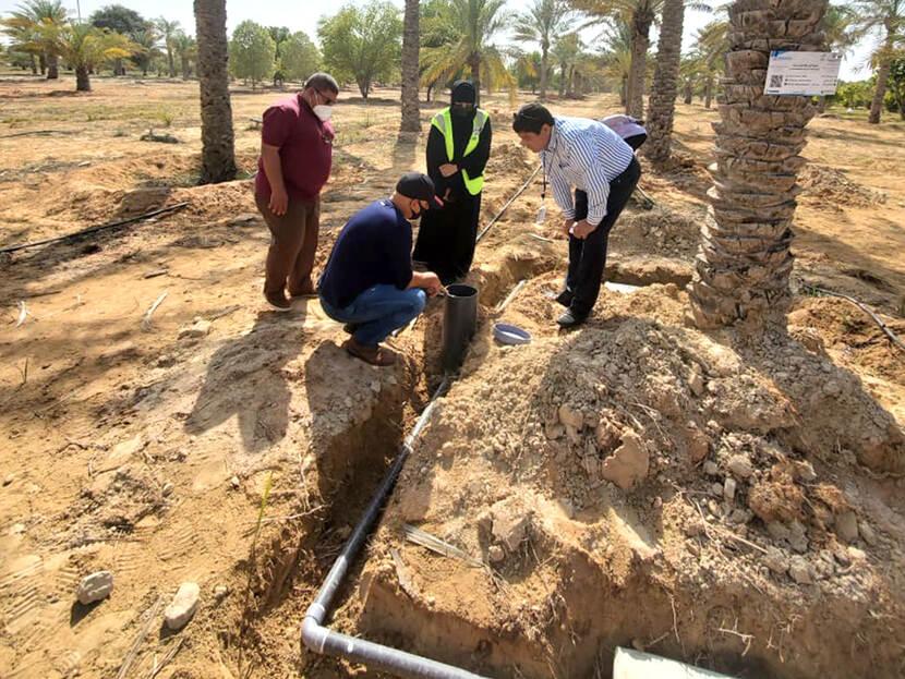 People water digging