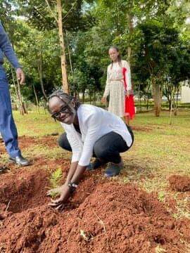 Hannah Margaret participating with the Embassy of the Netherlands during a tree planting event